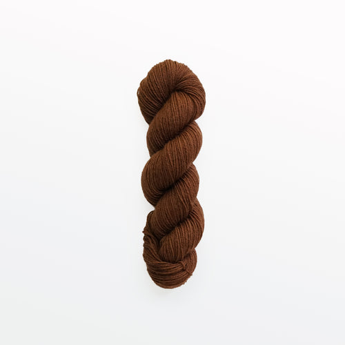 auburn fingering yarn, cutch and madder root, reddish brown, naturally dyed yarn, non-superwash, 218 yards, bluefaced leicester wool