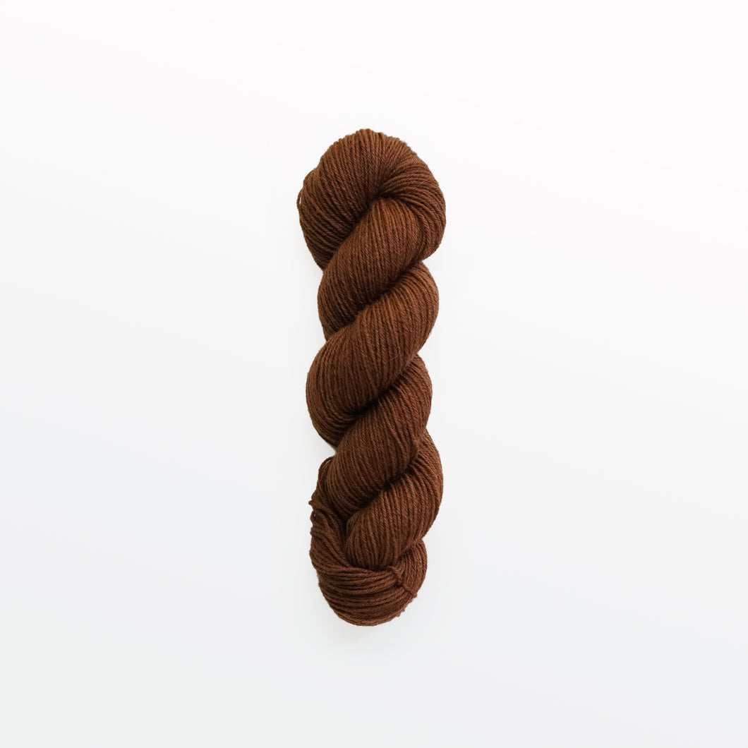 auburn fingering yarn, cutch and madder root, reddish brown, naturally dyed yarn, non-superwash, 218 yards, bluefaced leicester wool