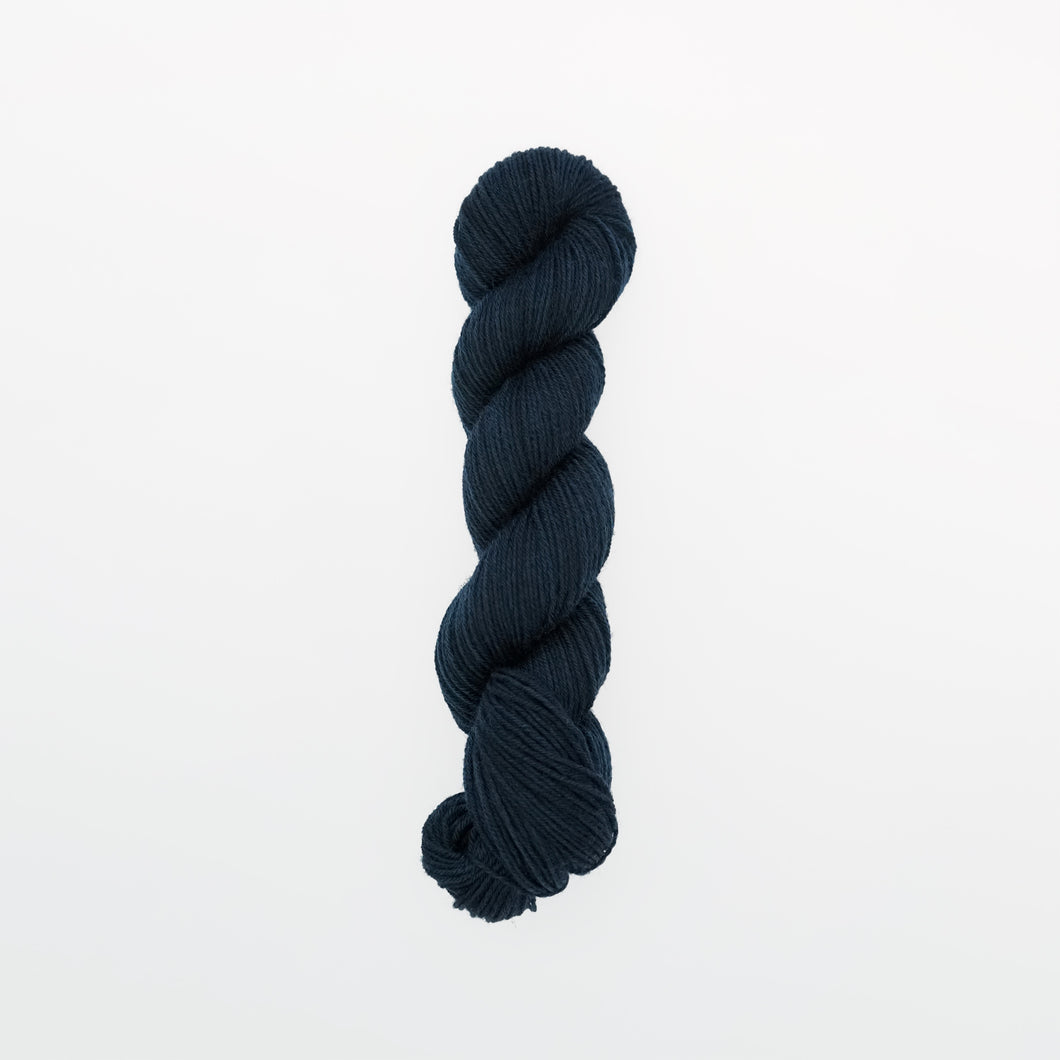 light denim fingering yarn, logwood, deep navy blue, naturally dyed yarn, non-superwash, 218 yards, bluefaced leicester wool