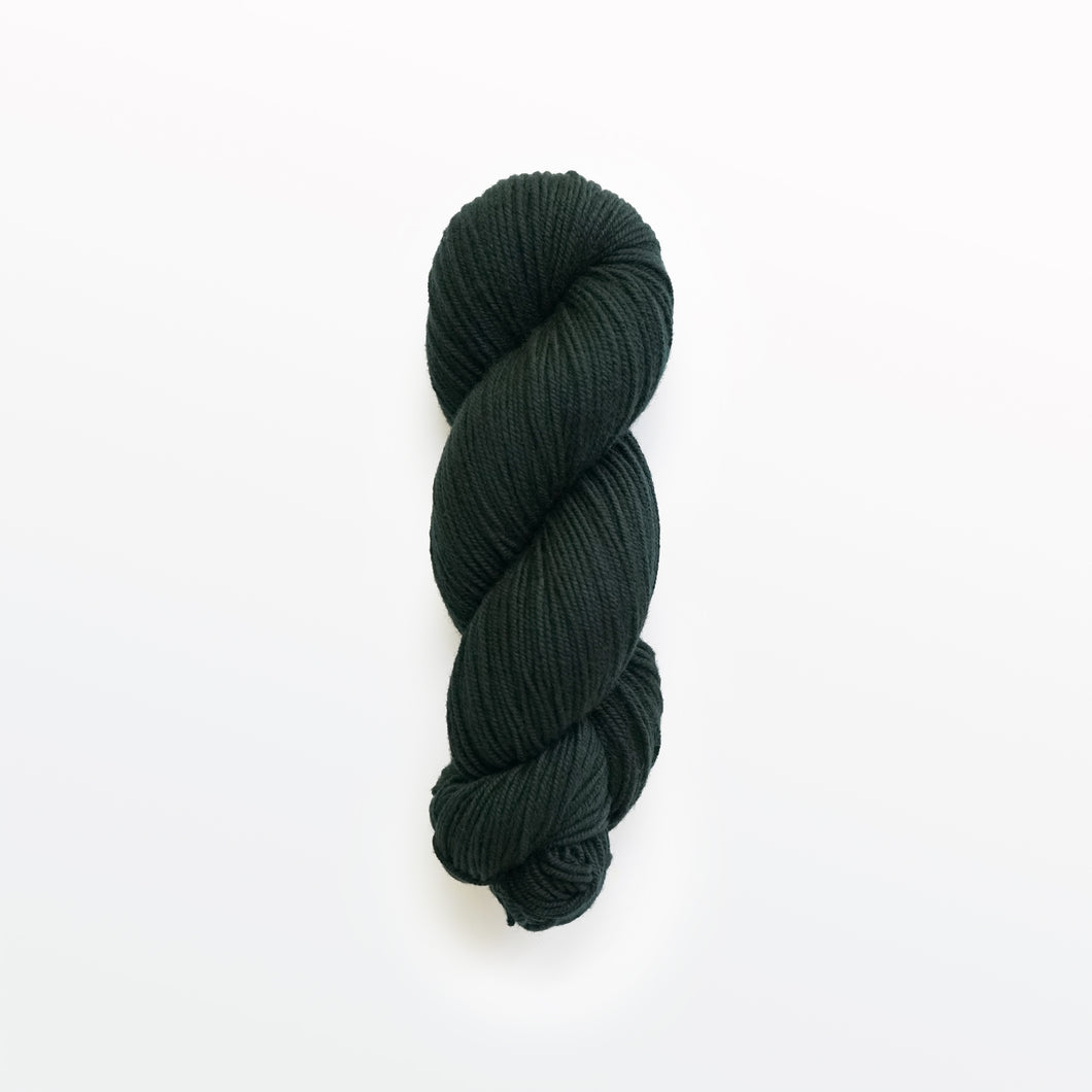 salamander DK yarn, logwood, weld, & fustic wood, greenish-black, naturally dyed yarn, non-superwash, 260 yards, Merino/Rambouillet cross wool