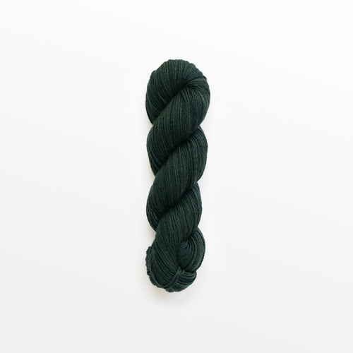 salamander fingering yarn, logwood, weld, & fustic wood, greenish black, naturally dyed yarn, non-superwash, 225 yards, merino/rambouillet cross wool