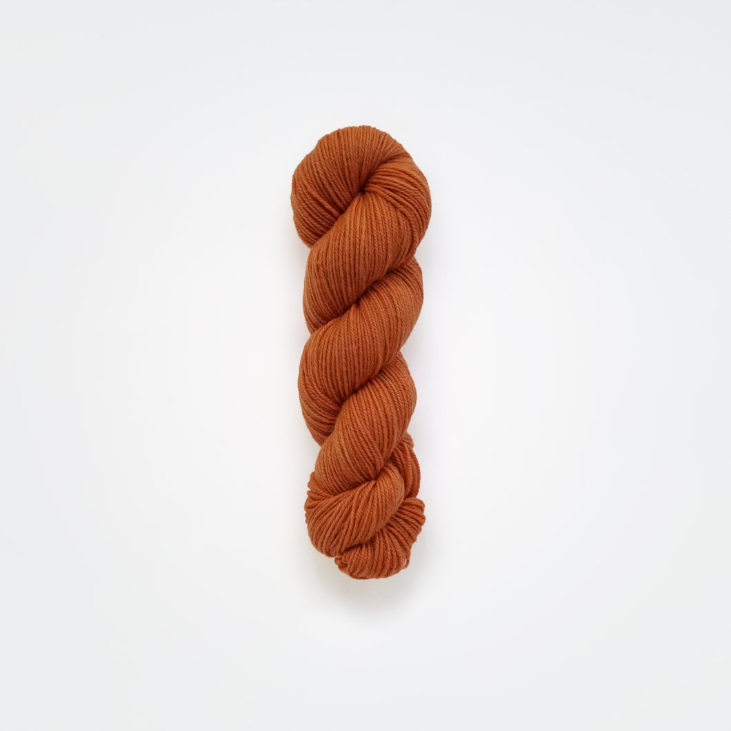 carrot fingering yarn, madder root, cutch, and marigold, medium orange, naturally dyed yarn, non-superwash, 225 yards, merino/rambouillet cross wool